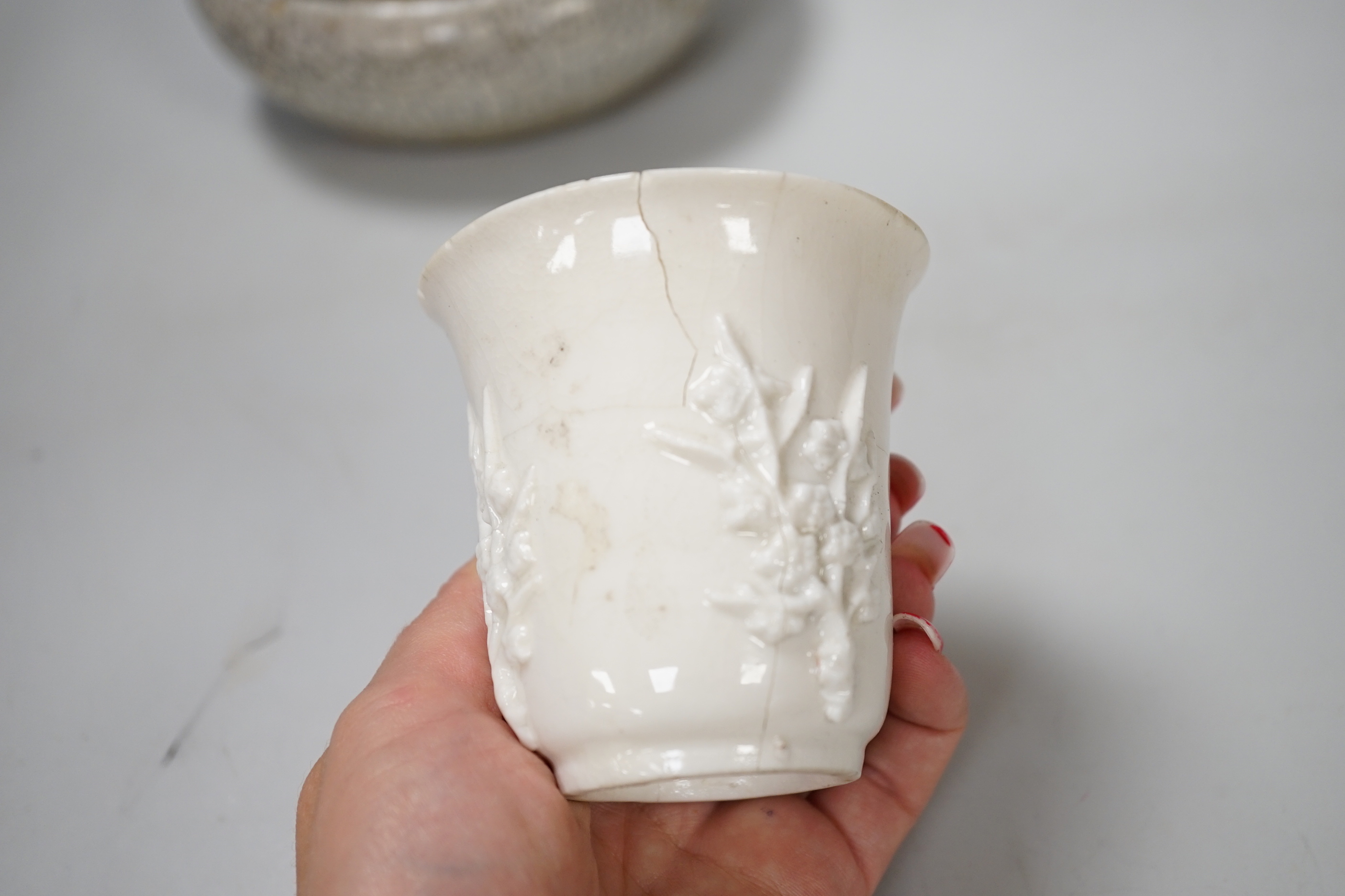 A Chinese crackleware bowl and a blanc de chine cup, bowl 14.5cm diameter
